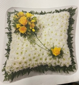 Yellow and white cushion